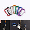 A set of colorful aluminum carabiner hooks displayed against a black background.