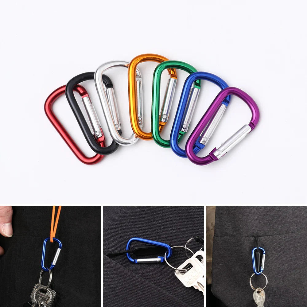 A set of colorful aluminum carabiner hooks displayed against a black background.
