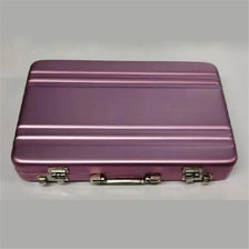 A rectangular purple aluminum case designed to hold credit cards and identification.