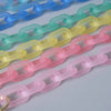 A collection of colorful, adjustable detachable chain shoulder bags arranged in a diagonal line.
