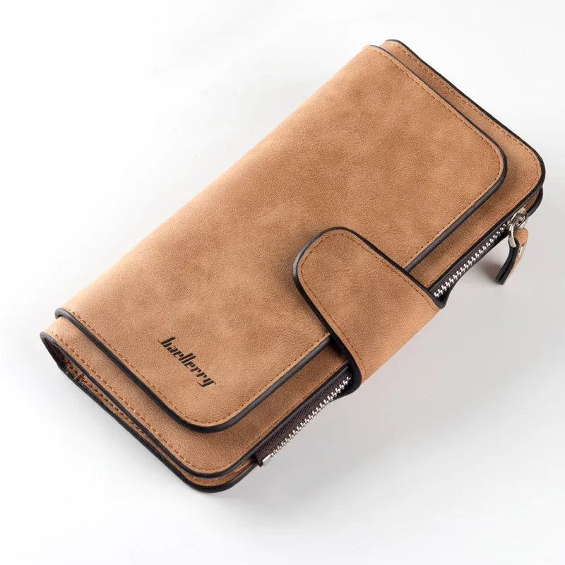 A tan PU leather card holder wallet with black stitching and a zipper, shown diagonally.