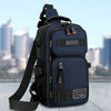 A navy blue multifunctional chest bag with black straps and buckles is shown against a blurred city skyline.