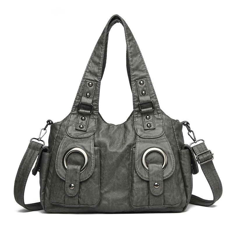 Dunkelgrabe Vintage Soft PU Leder-Schultertasche mit abgenutzter Textur und silberner Hardware.