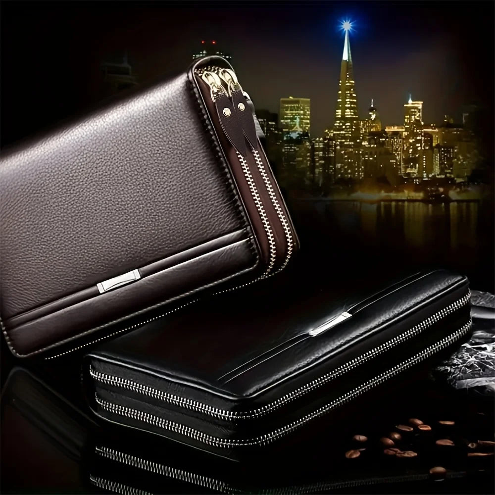 A dark brown leather mens long zipper wallet clutch displayed on a black surface.