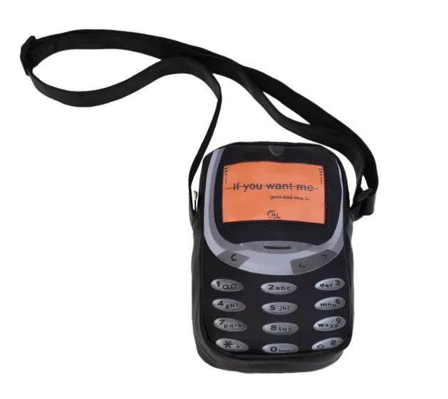 Black vintage Y2K telephone backpack with a display and strap.