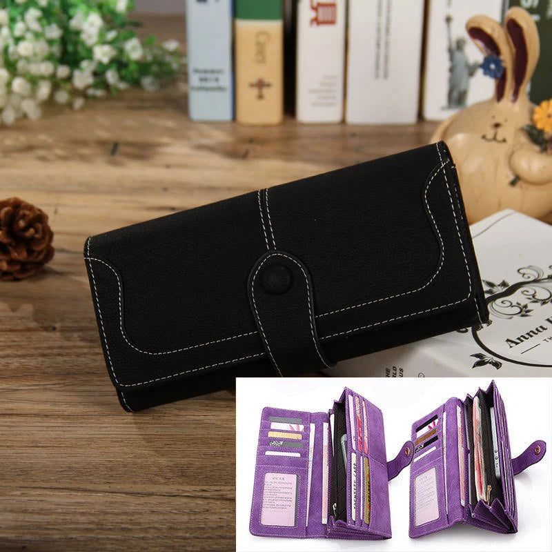 Black PU leather clutch wallet with stitching and a purple leather cardholder inside