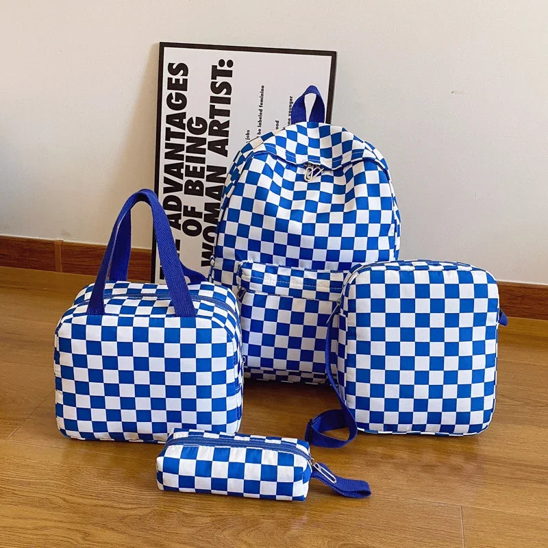 A blue and white checkerboard multi-pocket backpack displayed next to a sign.