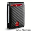 A black carbon fiber wallet with a flap showing a credit card and a compartment for cash.