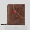 A brown men's PU waxed oil leather bi-fold wallet with stitching and a leather card slot.