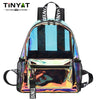 A clear PVC backpack with a multi-colored iridescent and metallic finish.