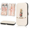 A beige cosmetic case featuring a stainless steel nail clipper set and a name design.