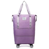 Pochette de voyage violette et extensible multi-usage avec poignées et base roulante.