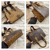 A set of three brown and tan patterned ladies' shoulder tote bags shown from different angles.