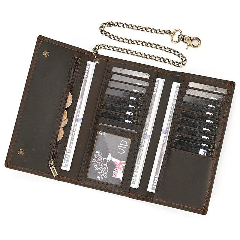 A brown leather bifold wallet with a metal chain is shown open, displaying multiple card slots.
