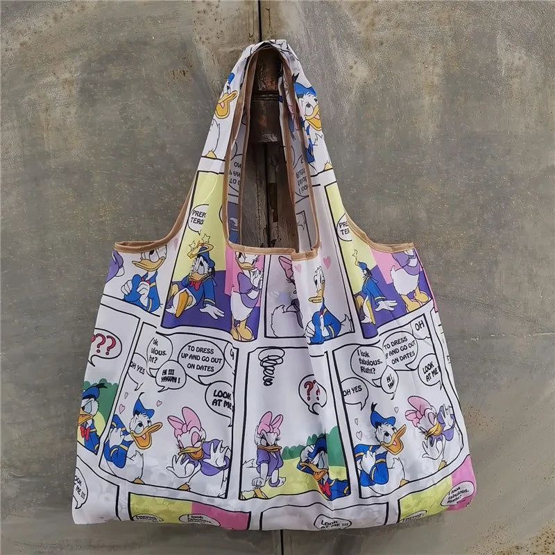 A white and pink reusable shopping bag featuring cartoon characters on a gray background.