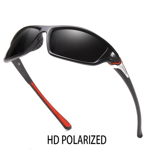 Black HD polarized sport sunglasses with orange accents shown against a white background.