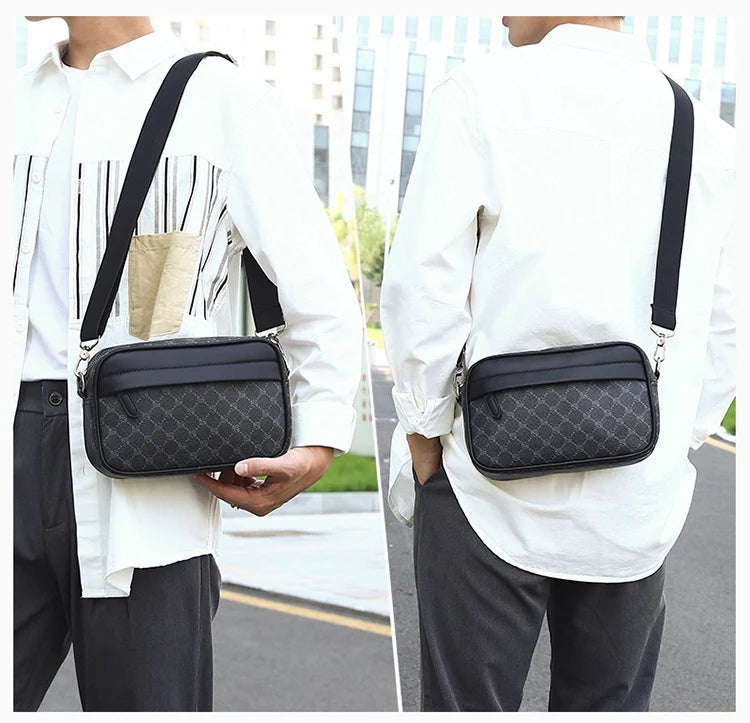 A man wearing a white shirt and dark pants carries a black PU leather shoulder clutch bag on his back.