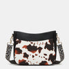 Black and white cow print PU leather shoulder crossbody bag with gold hardware