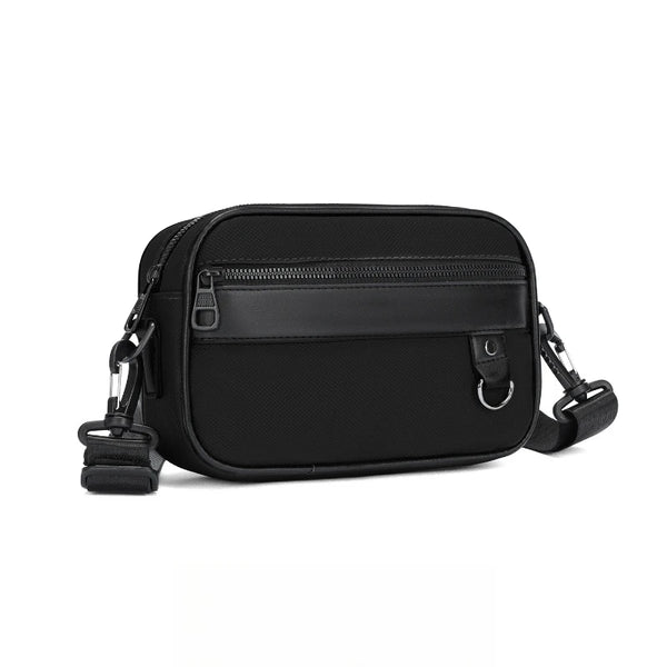 Black women's PU leather crossbody bag with an adjustable strap.