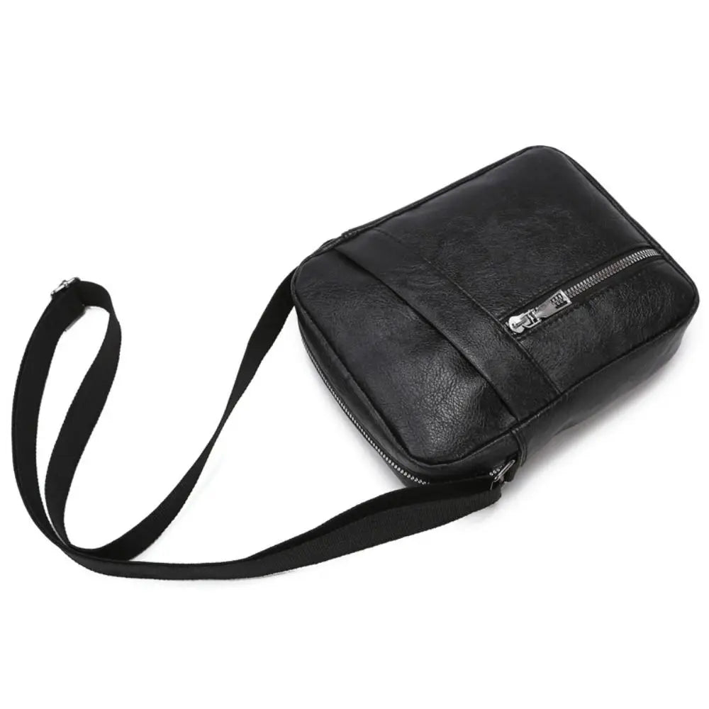Black waterproof PU leather sling bag with a zipper and a black strap