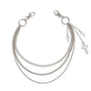Silver punk star chain belt featuring multiple strands and cross pendants