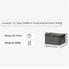 A black foldable non-woven storage bag suitable for storing spring and autumn clothing and several dolls.