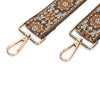 A brown and beige patterned textile replacement bag strap with gold-toned hardware.