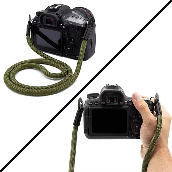 يد تمسك بكاميرا قابلة للتعديل وحزام كاميرا DSLR بحزام أخضر.