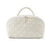 A white lay-flat water-resistant makeup organizer bag with a quilted texture and a zippered top.