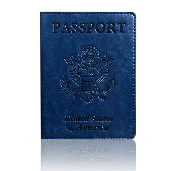 A dark blue leather passport holder wallet embossed with the United States of America eagle seal.