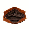 A brown PU leather crossbody tote bag shown open, displaying the interior lining.