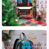 A clear PVC backpack with a holographic and iridescent finish displayed against a festive Christmas theme.