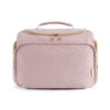 A light pink quilted cosmetic organizer bag with a handle and gold zipper details.