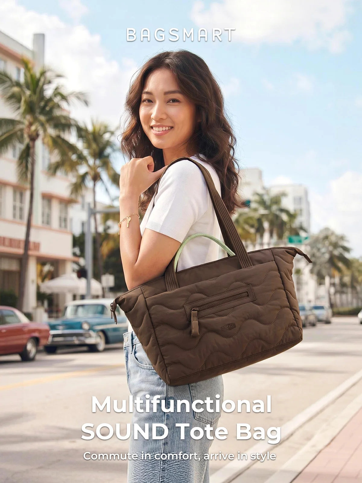 A woman holds a brown quilted multifunctional sound tote bag in a casual outdoor setting.