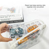 A hand holds a clear plastic storage pouch filled with small items, demonstrating the zipper type large opening feature.