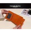 An orange multi-slot card holder is being held by a hand, displayed next to a card.