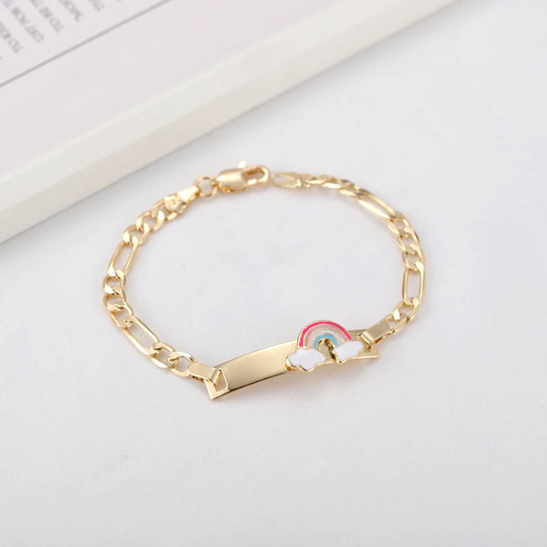 Gold chain bracelet with a rainbow heart charm on a white background.