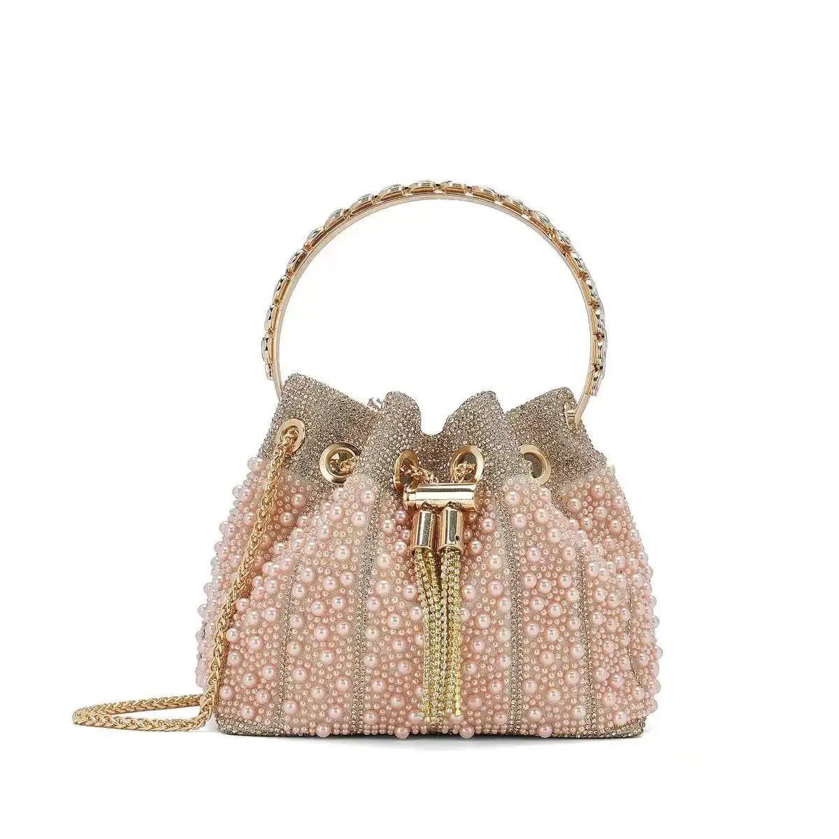 A light pink crystal-embellished evening clutch with a gold chain strap.