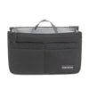 A black handbag organizer insert with a gray lining and a handle.