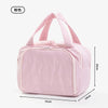 A pink multipocket travel toiletry bag with a quilted design shown from the top.