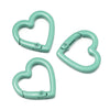 Three heart-shaped metal spring clasps in a mint green color shown separately.