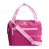 A pink insulated cooler lunch bag with a detachable strap is shown against a white background.