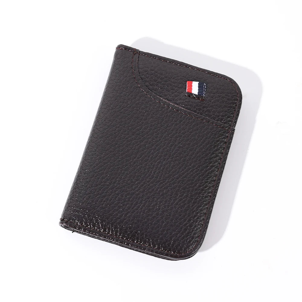 A black slim PU leather credit card wallet with a French flag detail on the corner.