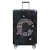 A black rolling suitcase with a transparent, patterned stretch fabric protection cover.