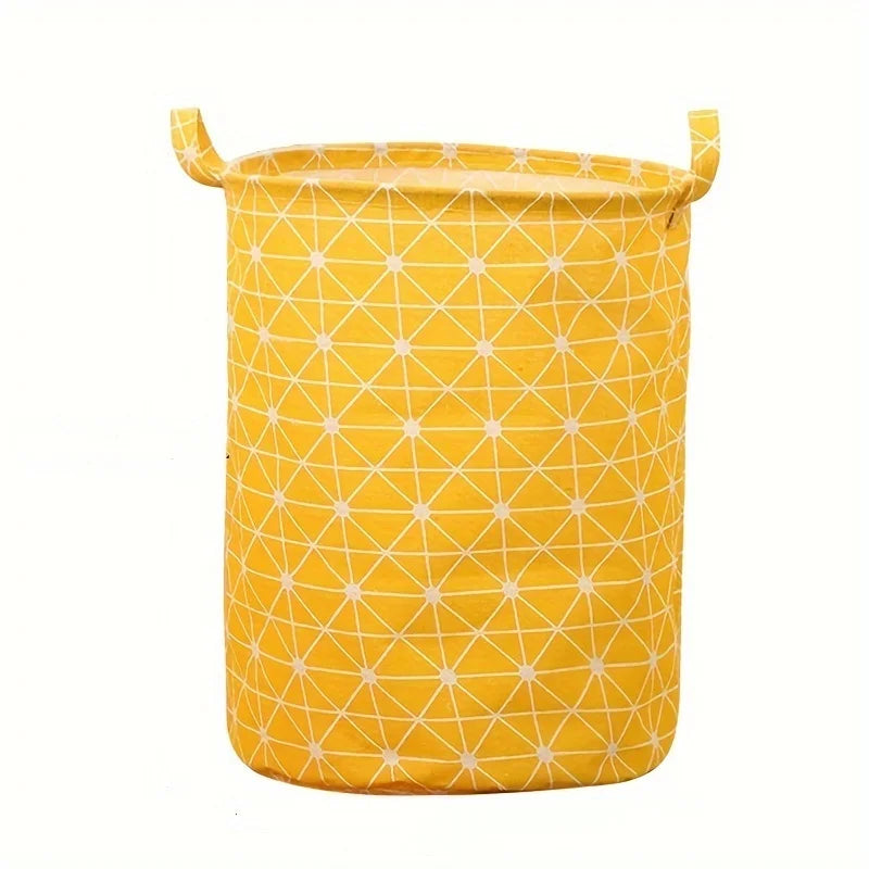 Panier à linge pliable jaune vif avec motif géométrique.
