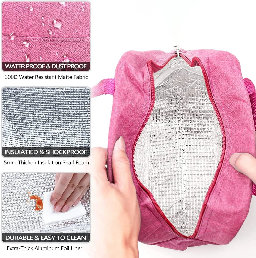 A pink insulated canvas lunch bag showing its interior lining and exterior fabric details.