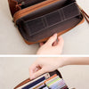A brown tri-fold wallet with a leopard print design is shown being held and displayed.