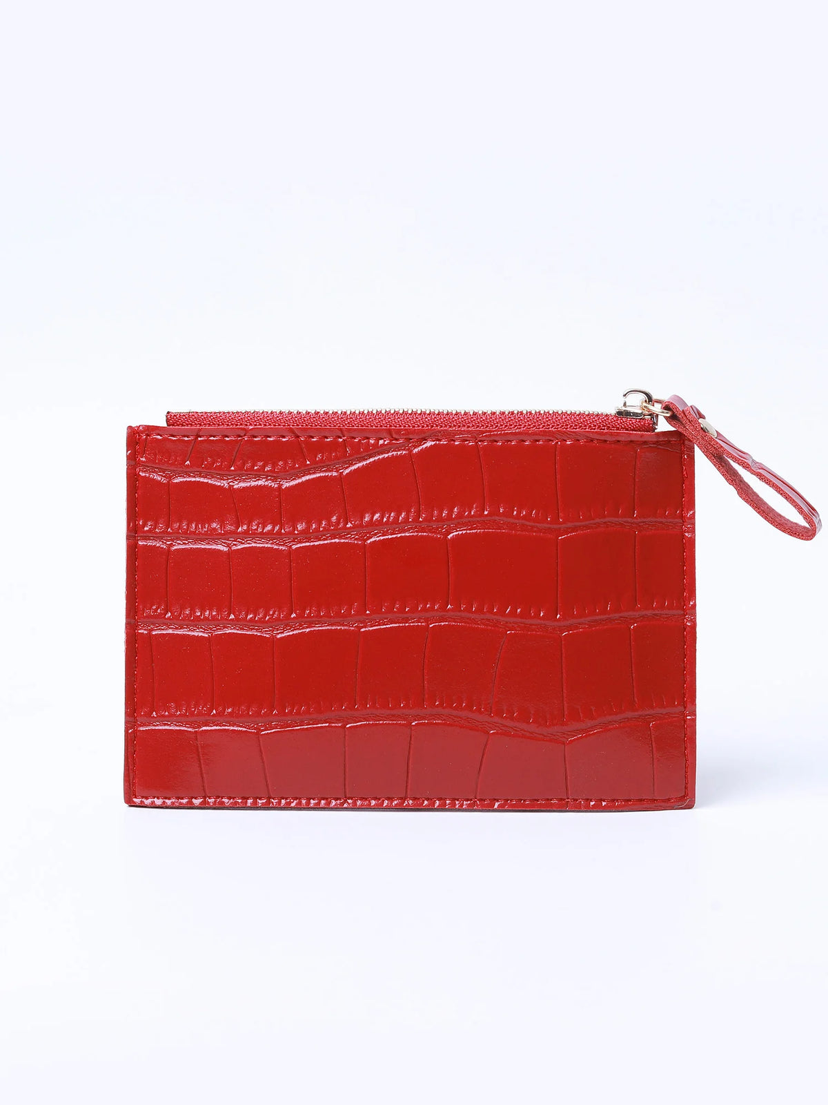 A red crocodile pattern leather card holder with a zipper on a white background.