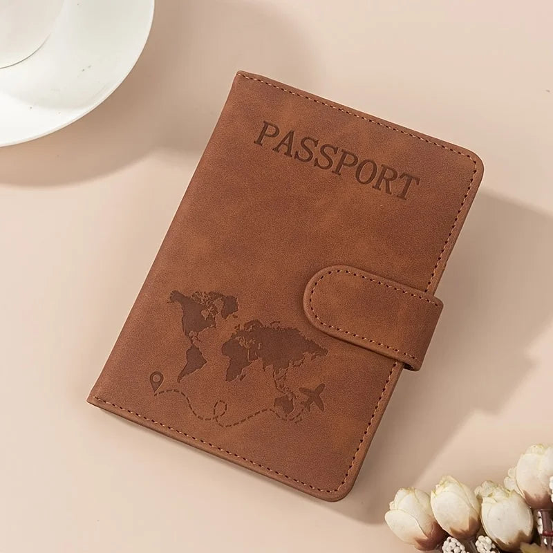 A brown leather passport wallet with a world map design is shown on a light background.