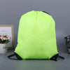 Neon lime green drawstring backpack with black trim and straps